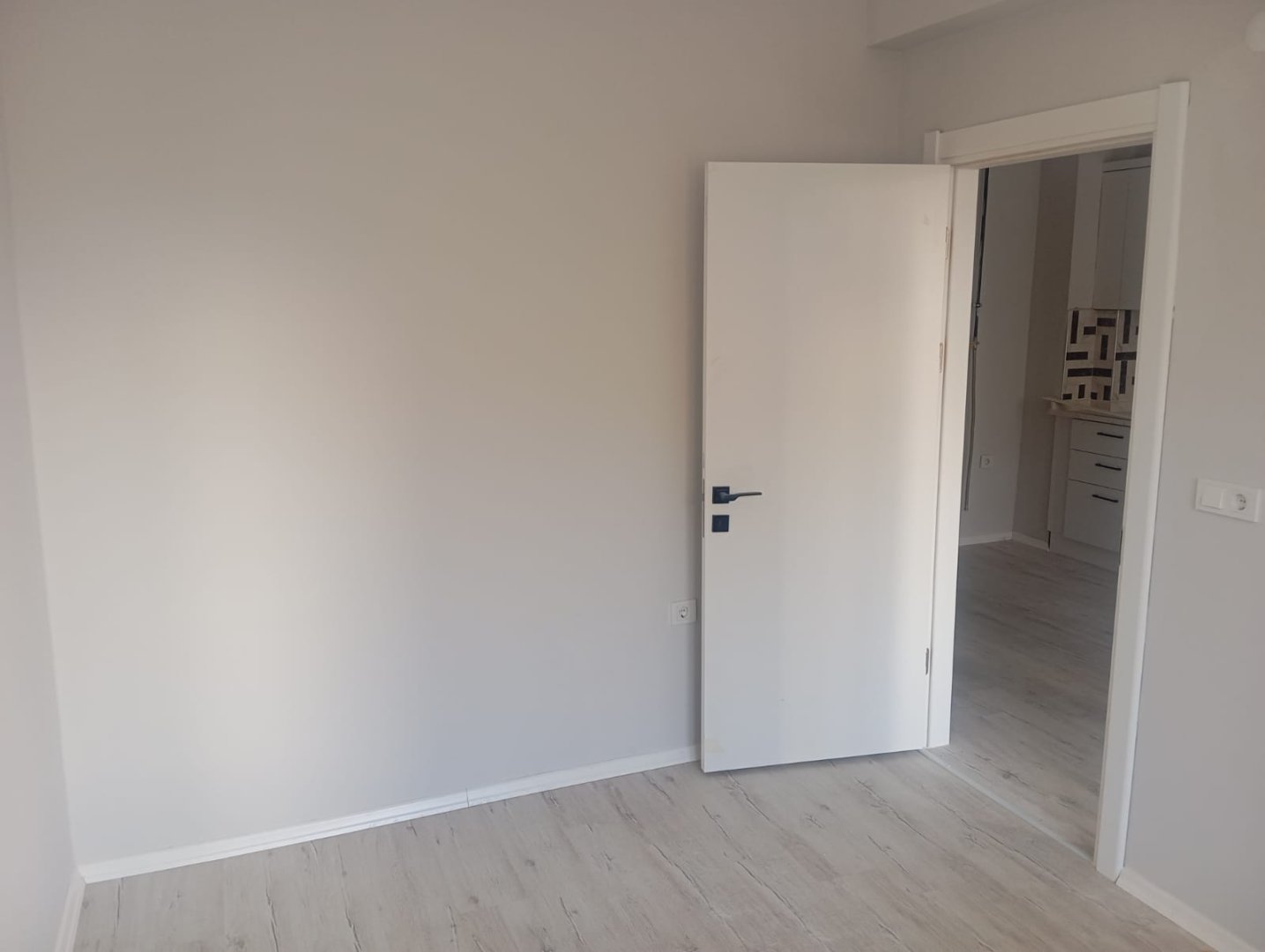 2000 EVLER MAHALLESİNDE PTT ÜZERİ 1+1 SATILIK DAİRE