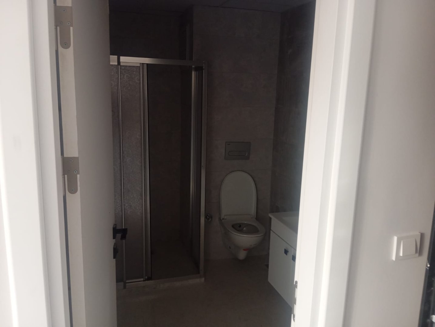 2000 EVLER MAHALLESİNDE PTT ÜZERİ 1+1 SATILIK DAİRE