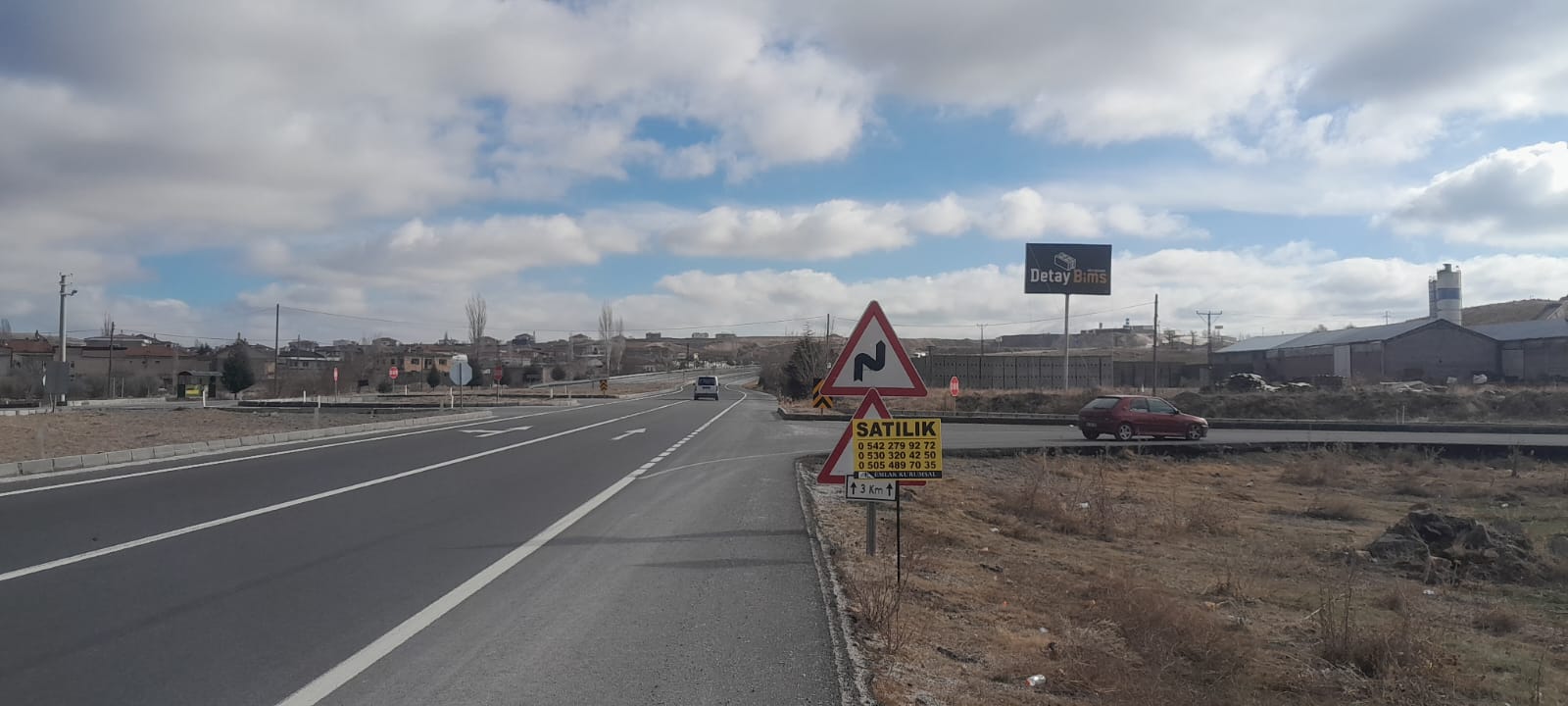 GÜVERCİNLİK KÖYÜNDE 7352M2 NİĞDE YOLU ÜZERİ SATILIK TARLA